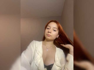 Webcam Belle - juliaq redhead vixen she takes her sexy lingerie set off and even rubs her shaved pussy to taste her own love juices online