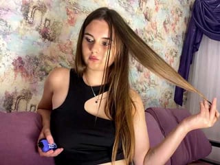 Webcam Belle - irisfox elegant cam girl in a revealing bra online