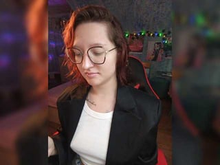 Webcam Belle - rosia-guess redhead vixen she takes her sexy lingerie set off and even rubs her shaved pussy to taste her own love juices online