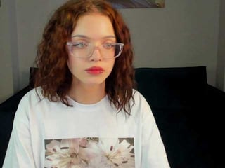 Webcam Belle - wullwet-rav redhead vixen she takes her sexy lingerie set off and even rubs her shaved pussy to taste her own love juices online
