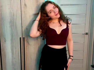 Webcam Belle - dimondately redhead vixen she takes her sexy lingerie set off and even rubs her shaved pussy to taste her own love juices online