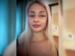 Webcam Belle - kirawhite redhead vixen she takes her sexy lingerie set off and even rubs her shaved pussy to taste her own love juices online