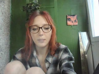 Webcam Belle - meaghanbremme redhead vixen she takes her sexy lingerie set off and even rubs her shaved pussy to taste her own love juices online